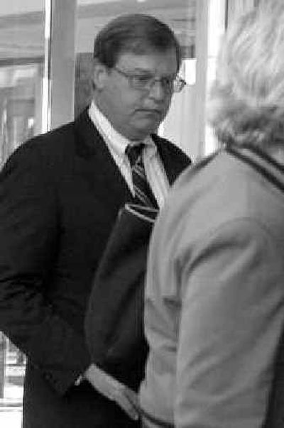 
Former Merrill Lynch banker James A. Brown after his conviction. 
 (Associated Press / The Spokesman-Review)