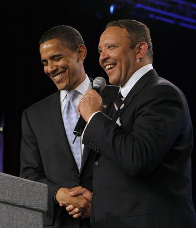 Sen. Barack Obama, left, smiles as Marc Morial, president and CEO of the National Urban League, asks attendees to sing a birthday song for Obama at the National Urban League Annual Conference in Orlando, Fla., on Saturday. Obama’s birthday is Monday.  (Associated Press / The Spokesman-Review)