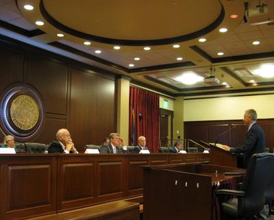Idaho state forester David Groeschl briefs the Land Board Tuesday on the upcoming wildfire season (Betsy Russell)