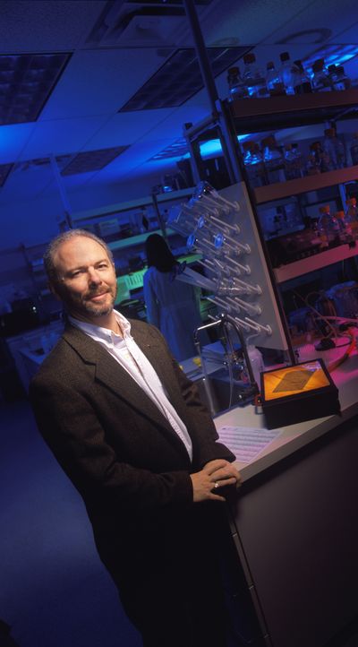 Michael Skinner is shown in a portrait in his lab at Washington State University.