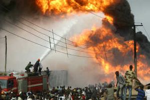 
Firemen attempt to put out flames erupting from a fuel pipeline in a village outside Lagos, Nigeria, on Thursday. Associated Press
 (Associated Press / The Spokesman-Review)