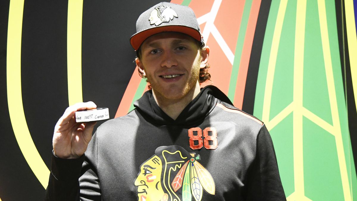 NHL roundup: Patrick Kane scores 1,000th point of career ...