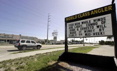 
A sign at a fishing store alerts anglers  to conditions Sunday in Marathon in the Florida Keys. 
 (Associated Press / The Spokesman-Review)