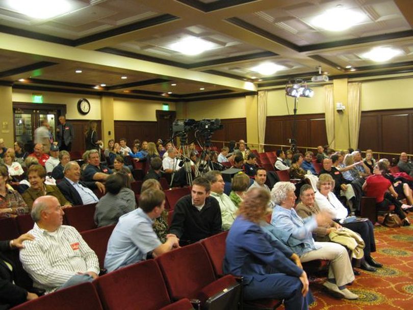 Audience members filter in for tonight's 1st Congressional District debate in the Capitol Auditorium between Congressman Walt Minnick, GOP challenger Raul Labrador and independent Dave Olson. (Betsy Russell)