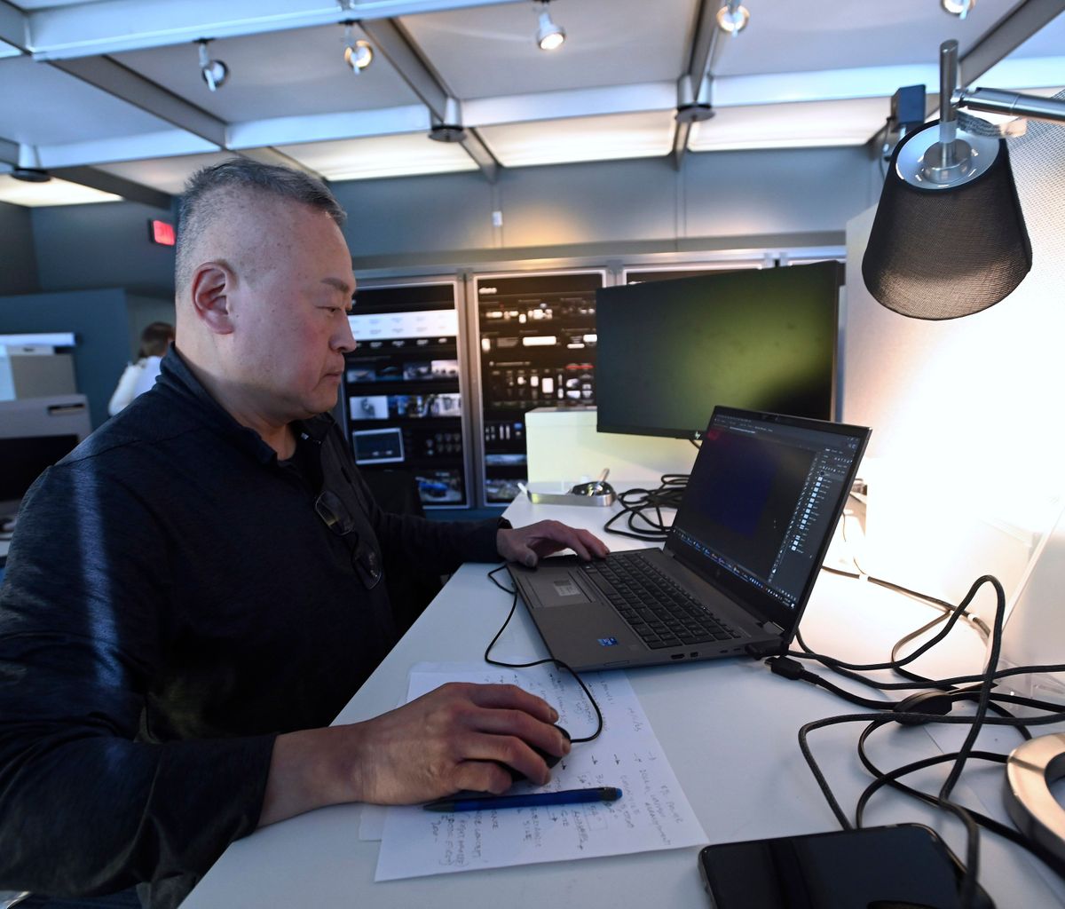 Lead creative designer Sung Paik works with other architecture and experience team members at General Motors Co.'s Global Technical Center on April 11.  (Detroit News)