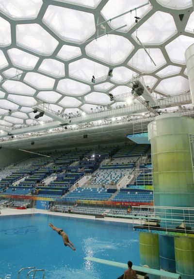 Cesar Castro of Brazil practices his diving routine at the National Aquatics Center, also known as the 