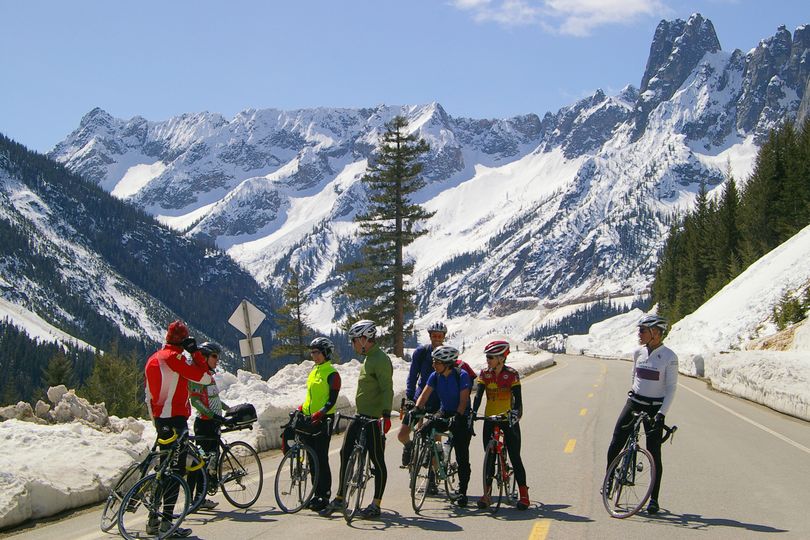 Cyclists from the Mazama area enjoy riding the North Cascades Highway vehicle-free while Washington Department of Transportation crews work to clear snow.