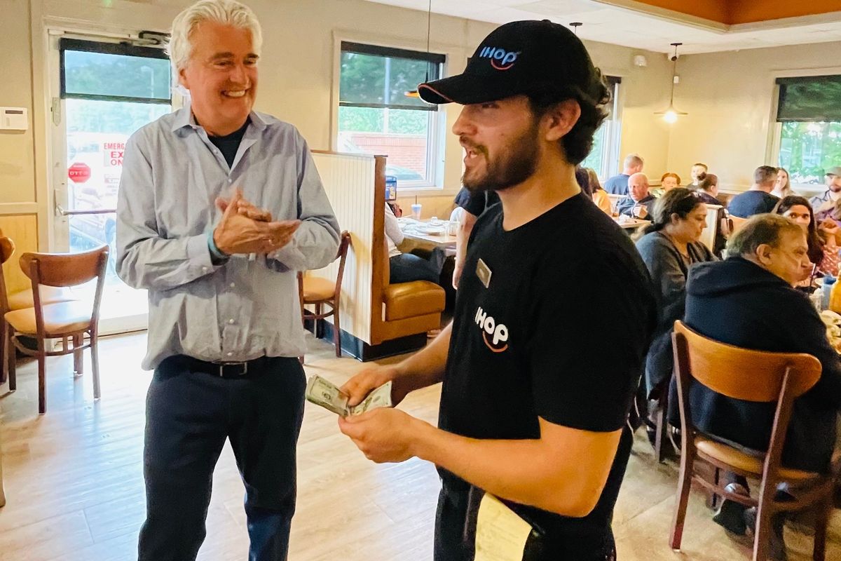Roberto Rivas, right, with Richard Brooks, the founder of the $1,000 Breakfast Club, in June 2023. Brooks and other club members left Rivas a $1,600 tip at the IHOP in Norwood, Mass. (Laurie Brooks/Handout)