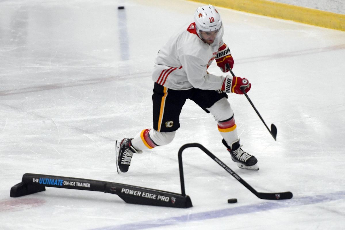 Derek Ryan of the Calgary Flames makes his way past an attack triangel during practice at Frontier Ice Arena in Coeur d'Alene on Wednesday, June 4, 2020. (Kathly Plonka/The Spokesman-Review)