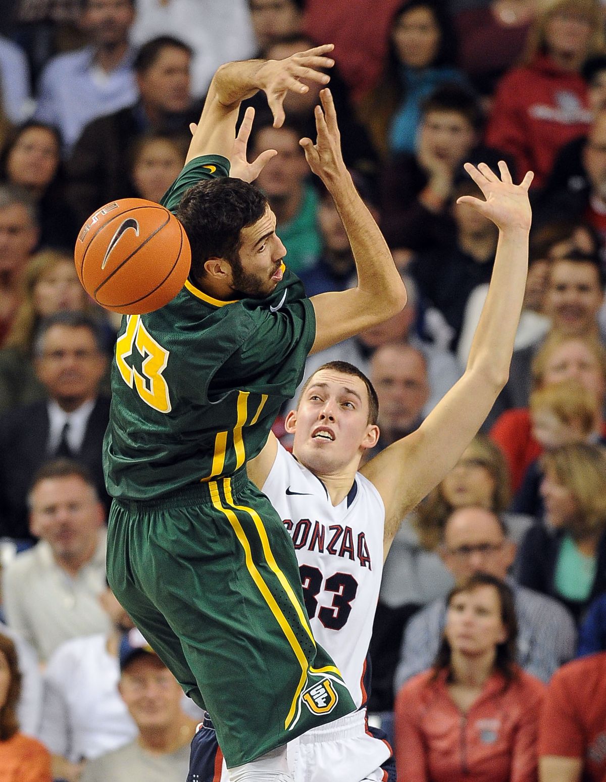 San Francisco’s Mark Tollefsen loses ball under defensive pressure from Gonzaga’s Kyle Wiltjer. (Colin Mulvany)