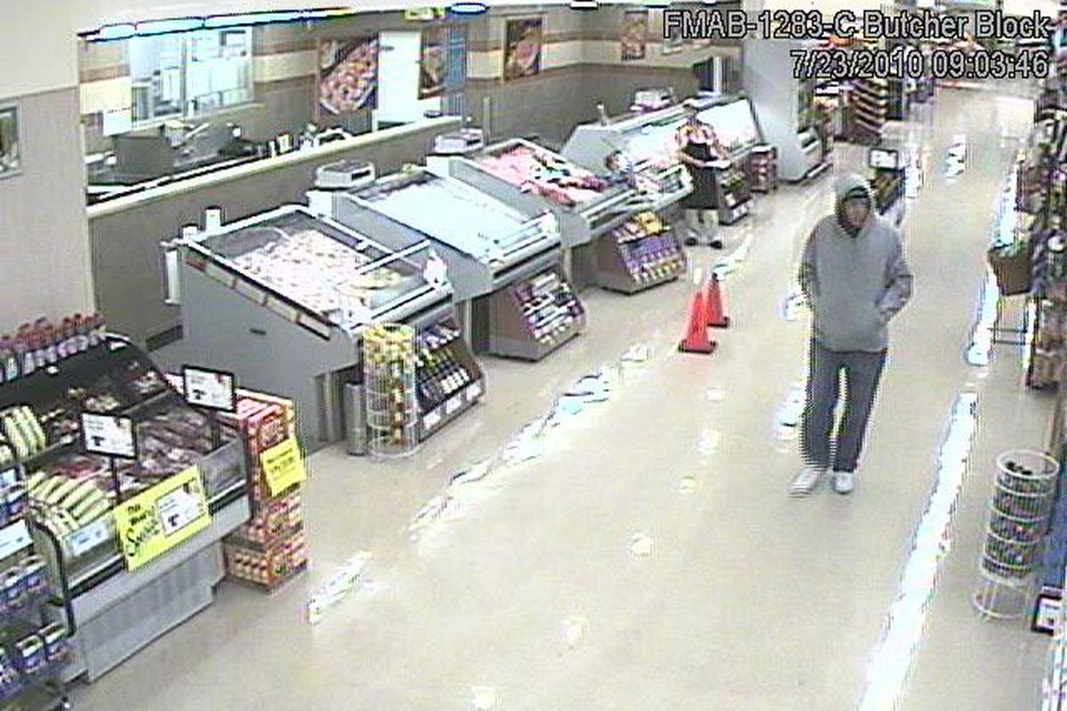 This surveillance image shows a man police believe to be Nicholas "Niko" Burden, 31, just before a gunpoint OxyContin at the Albertsons pharmacy at 57th and Regal on July 23. Police say Burden shot himself during a police chase following an OxyContin robbery at Rite Aid on 29th Avenue on Aug. 3. He was pronounced dead Aug. 4. (Spokane County Sheriff