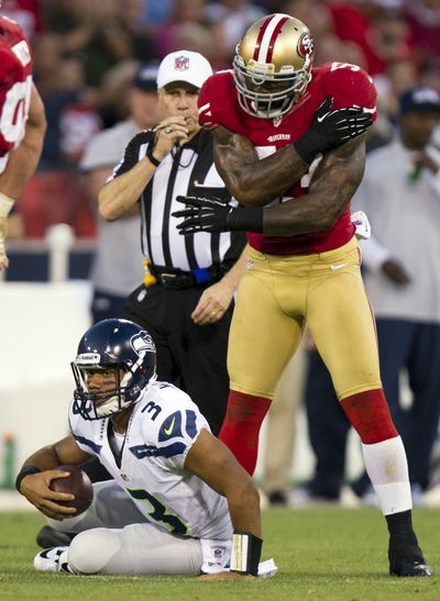 San Francisco’s NaVorro Bowman celebrates after sacking Seattle’s Russell Wilson on Oct. 18.
