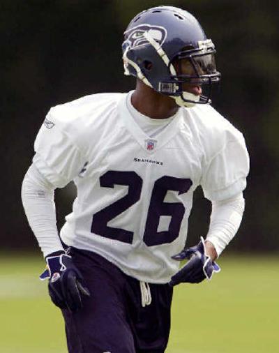 
Seattle's Ken Hamlin runs during team's minicamp in Kirkland, Wash., on Friday.
 (Associated Press / The Spokesman-Review)