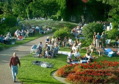 
People fan out across the Arbor Crest Wine Cellars yard and listen to music on a recent Sunday.  Live performances are scheduled on Sunday nights throughout the summer. 
 (Joe Barrentine / The Spokesman-Review)