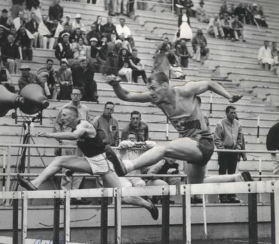Former Rogers track standout Denny Driskill, right, races against Ritzville’s Spike Arlt in 1956. (The Spokesman-Review)