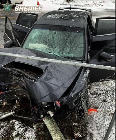 A car lost control on North Park Road and crashed into a tree, sending its three occupants to the hospital with serious injuries that weren’t believed to be life-threatening, according to the sheriff’s office.  (Spokane County Sheriff's Office)