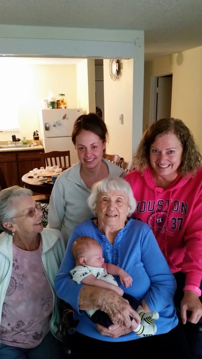 Myrle Collins holds her great-great-grandson, Tristan Domke, both of Spokane Valley. Also pictured, clockwise from left, are her daughter, Myrlene Haskell of Spokane; great-granddaughter, Kaleena Domke of Spokane Valley; and granddaughter, Becky Key of Otis Orchards.