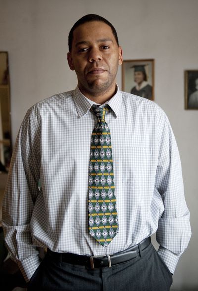 In this Jan. 24, 2011 photo, John Stone of Chicago wears a Green Bay Packers tie. Stone was fired from his job as a car salesman at an Oak Lawn, Ill. dealership Monday after refusing to remove the tie after the Packers beat the Chicago Bears in the NFC Championship game. He said he wore the tie to honor his late grandmother, who was a big Green Bay fan. His boss said Stone was offered five chances to take off the tie and refused to do it. (Jean Lachat / Chicago Sun-times)
