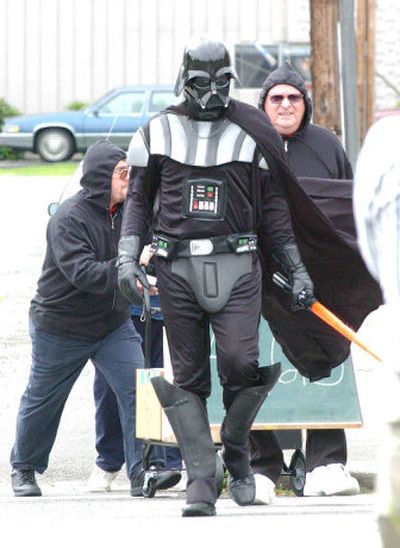 
Ballot measure promoter Tim Eyman arrives at the Secretary of State's Office on Monday Dressed as 