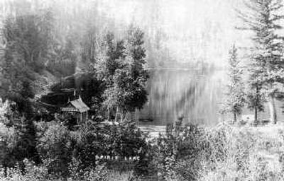 
The picture, taken around 1900, shows Pete Rhodebeck's store and Rocky Beach in the southeast corner of Spirit Lake where Rhodebeck located both his store and cabin. A public fisherman's access currently occupies a portion of this delightful place. Photo courtesy of the Spirit Lake Historical Society; from the Mike Fritz postcard collection
 (Photo courtesy of the Spirit Lake Historical Society; from the Mike Fritz postcard collection / The Spokesman-Review)