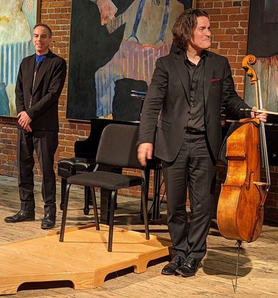 Matt Herskowitz, left, and Zuill Bailey stand during Sunday’s performance at the Northwest Bach Festival and Series. 