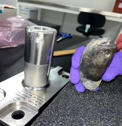 A recovered piece of metal from the NASA flight support equipment used to mount International Space Station batteries on a cargo pallet in 2021. It survived reentry through Earth's atmosphere on March 8 and hit a home in Naples, Florida.   (Handout/NASA/TNS)