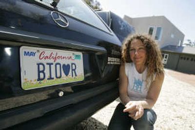 Colette Brooks displays part of her collection of vintage cars that run on biodiesel fuel. Associated Press
 (Associated Press / The Spokesman-Review)