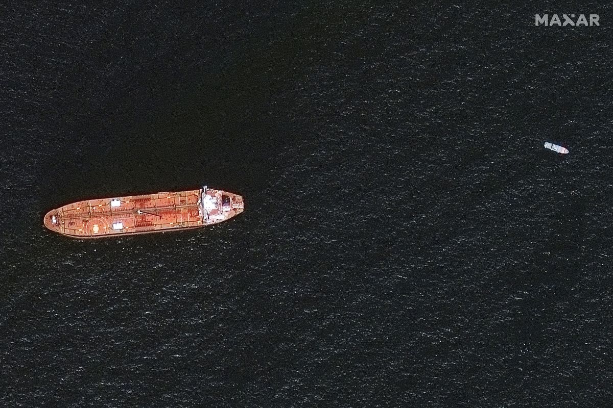 In this image provided by Maxar Technologies, the oil tanker Mercer Street is seen off the coast of Fujairah, United Arab Emirates, Wednesday Aug. 4, 2021. The United States, United Kingdom and Israel blame Iran for an attack on the Mercer Street off Oman that killed two people amid tensions over Tehran