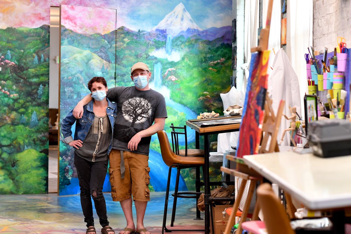 Morgan Walters and her fiancé Anthony Edwards are photographed at their new art collective M.A.D. Co. Lab Studios on Wednesday in Spokane.  (Tyler Tjomsland/The Spokesman-Review)