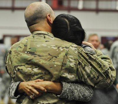 South Carolina Gov. Nikki Haley hugs her husband, Capt. Michael Haley, during a deployment ceremony Thursday. (Associated Press)