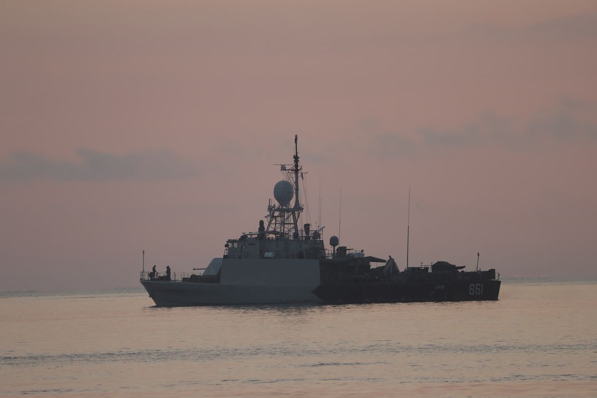 An Indonesian navy patrol ship sails to join the search for submarine KRI Nanggala that went missing while participating in a training exercise on Wednesday, off Banyuwangi, East Java, Indonesia Sunday, April 25, 2021. Indonesia’s navy on Saturday declared its missing submarine had sunk and cracked open after finding items from the vessel over the past two days, apparently ending hope of finding any of the 53 crew members alive.  (Achmad Ibrahim)