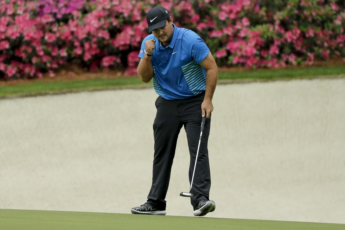 Patrick Reed reacts to his eagle on the 13th hole during the third round at the Masters  Saturday in Augusta, Ga. (David J. Phillip / Associated Press)
