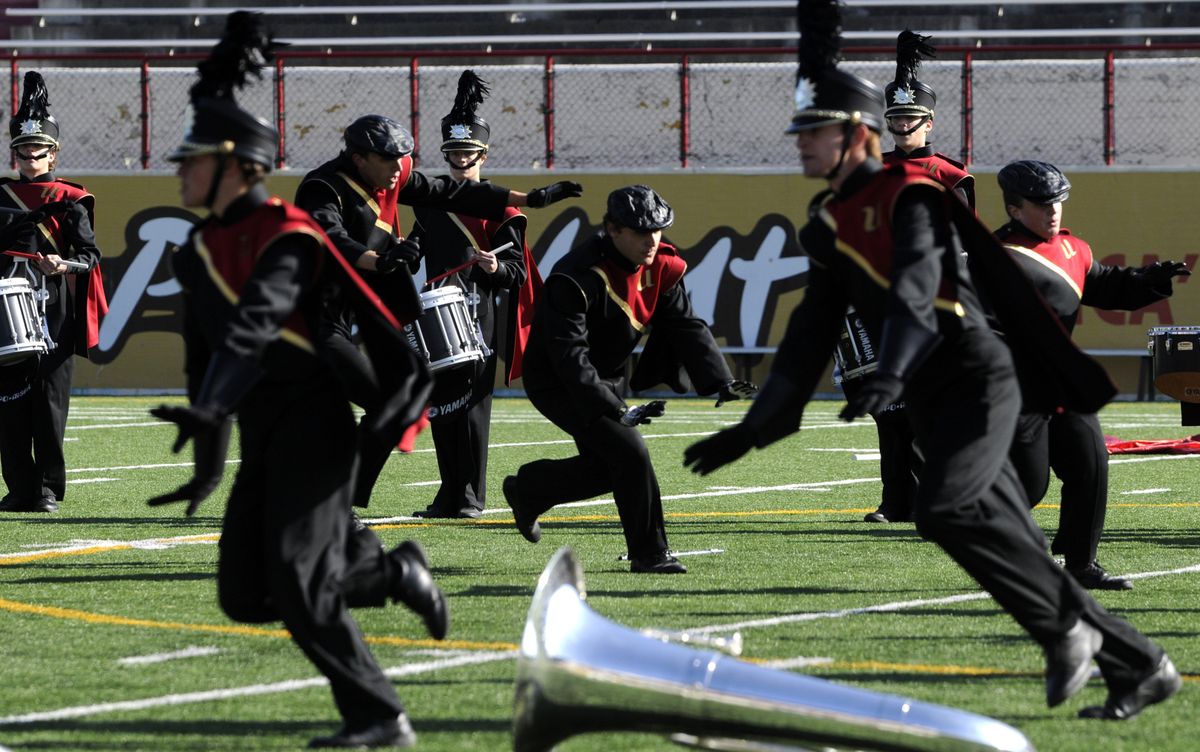 Members of the University High band dance during their preliminary competition in the Pacific Northwest Marching Band Championship on Saturday at Joe Albi Stadium. The U-Hi band played theme music from the movie “King Kong.”  (Photos by JESSE TINSLEY / The Spokesman-Review)