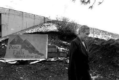 
Planning and Zoning Commissioner Linda Wilhelm is near the first portion of one of the new monuments in Post Falls. The final structures will be 16-by-18 feet. 
 (Kathy Plonka / The Spokesman-Review)