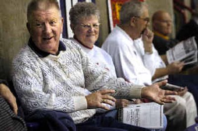 
Joe Bussard cracks a joke while sitting with his wife Jolane in the Spokane Arena Friday morning. Bussard is attending his 48th State B tournament. 
 (Holly Pickett / The Spokesman-Review)