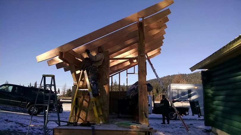 Volunteers work to construct a warming hut that will be hauled out to a distant loop on the 60K Mount Spokane Cross-Country Ski Park. (Tim Ray)