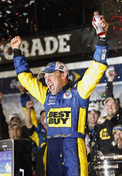 Matt Kenseth celebrates after winning the much-delayed NASCAR Daytona 500. (Associated Press)