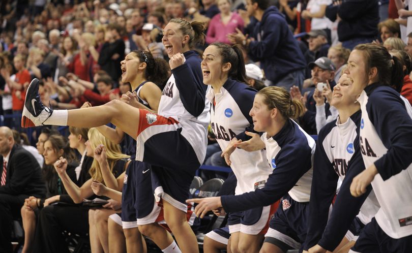 The Gonzaga bench celebrates during the final minute of their 89-75 win over UCLA  on Monday, March 21, 2011, in Spokane, Wash. (Colin Mulvany / The Spokesman-Review)