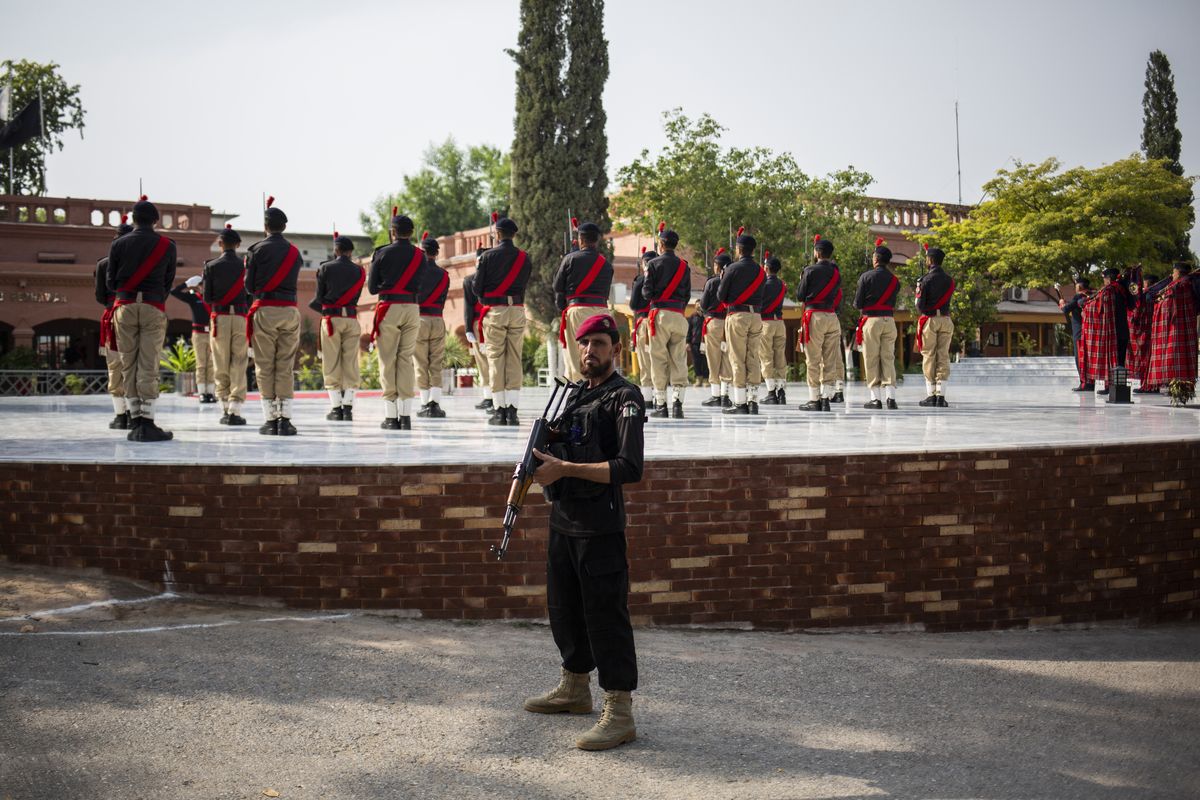 Police in Peshawar, Pakistan, gather Sept. 28 to pay tribute to those killed in a January attack on a mosque inside the police compound. MUST CREDIT: Saiyna Bashir for The Washington Post  (Saiyna Bashir/For The Washington Post)