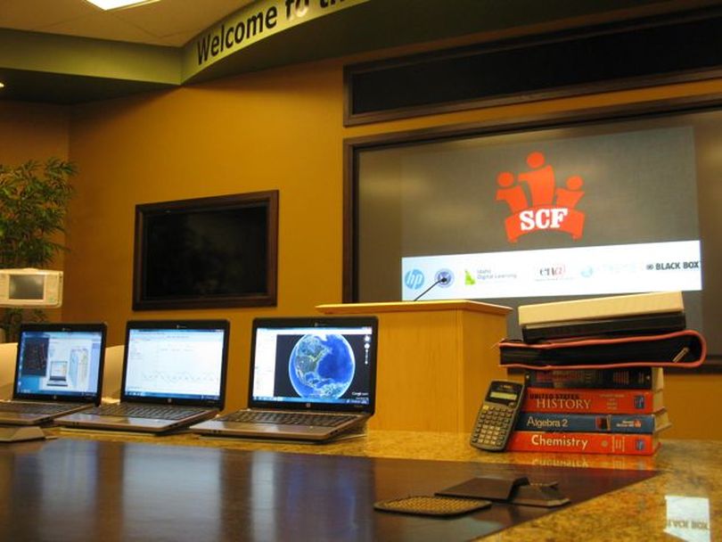 Laptop computers that are the subject of a new $182 million contract with the state of Idaho are displayed at Hewlett-Packard's Boise plant last week (Betsy Russell)