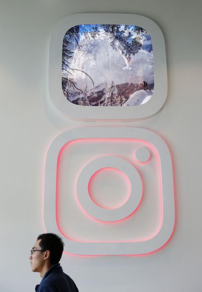 The Instagram logo and streaming images decorate the Instagram lobby on Tuesday, Oct. 4, 2016 in Menlo Park, Calif. (Gary Reyes / Tribune News Service)