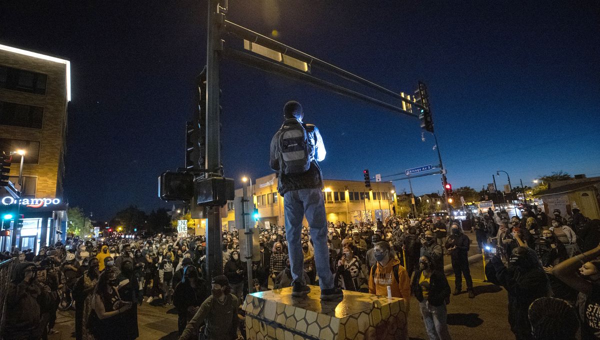 Protesters block an intersection in Minneapolis on Wednesday, Oct. 7, 2020, after Derek Chauvin, the former Minneapolis police officer charged with murder in the death of George Floyd, posted bail and was released from prison.  (Carlos Gonzalez)