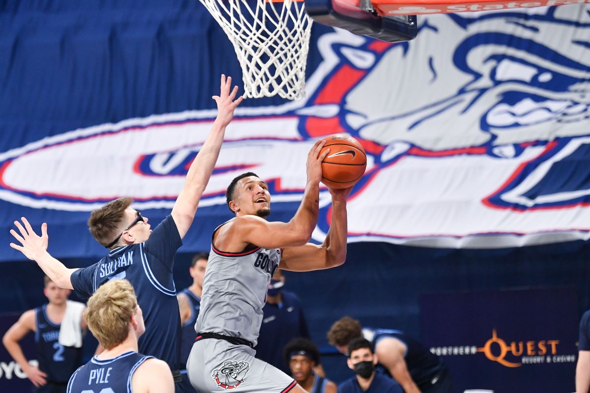 Gonzaga Bulldogs guard Jalen Suggs (1) fights to the basket during the first half of a college basketball game on Saturday, February 20, 2021, at McCarthey Athletic Center in Spokane, Wash. Gonzaga led 51-22 at the half.  (Tyler Tjomsland/THE SPOKESMAN-RE)