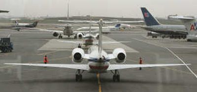 
Jetliners wait for takeoff on one of LaGuardia Airport's two runways in New York in this file photo. Associated Press
 (Associated Press / The Spokesman-Review)