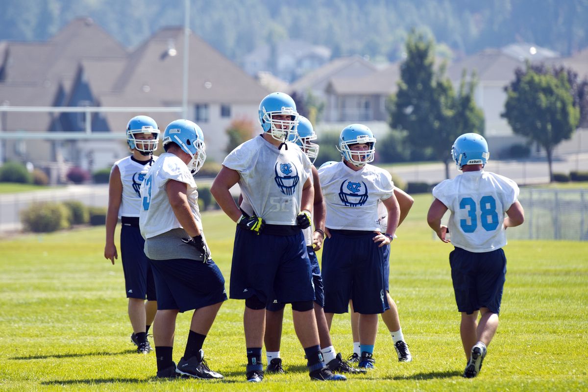 At 6-foot-7 and around 300 pounds, Central Valley tackle Scott Peck isn’t hard to pick out as he waits with his teammates for drills to start. (Jesse Tinsley)