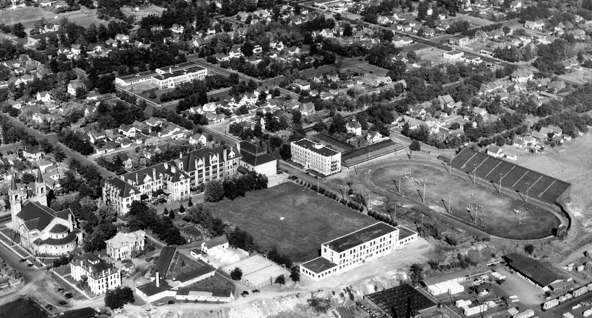This picture of Gonzaga University campus was taken in 1949, just one year after the university became co-ed. Conspicuous in the photo is the football stadium, which is no longer part of the Spokane campus. The football program ended in 1942. (File photos)