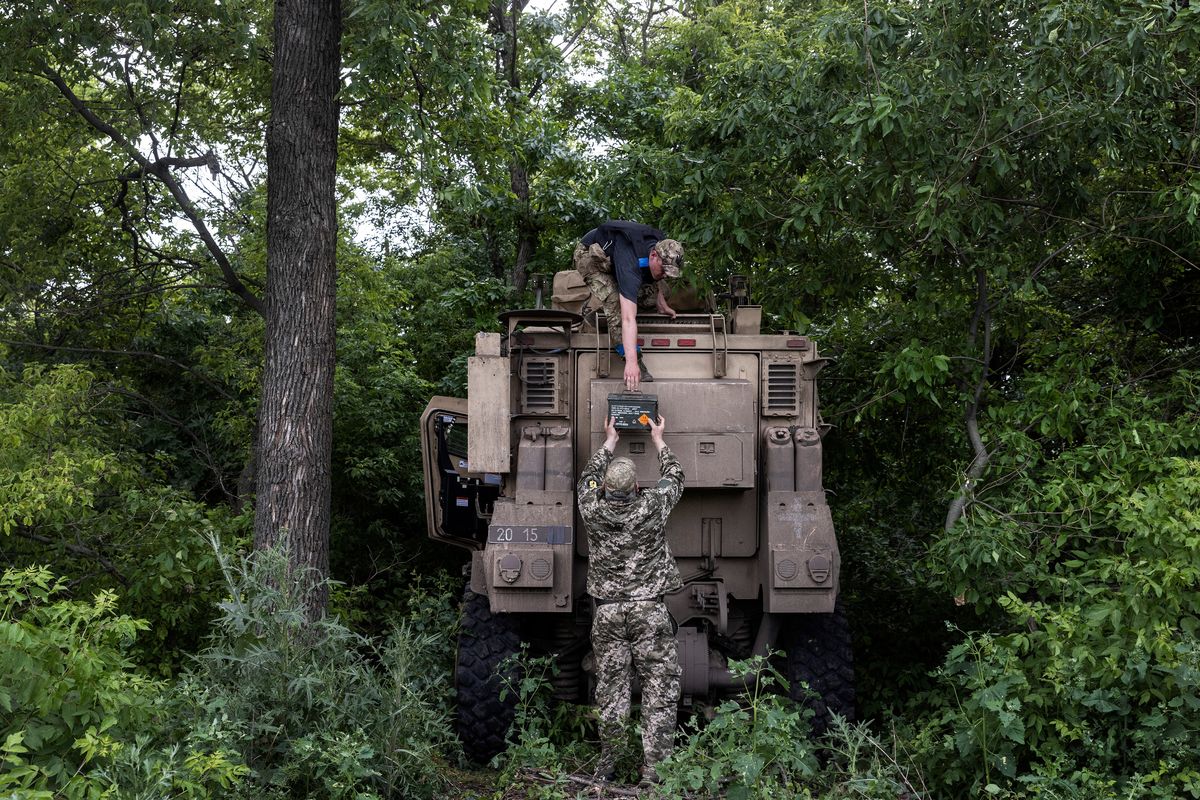 FILE -- Soldiers from Ukraine's 68th Brigade stage their U.S.-manufactured Mine Resistant Ambush Protected (MRAP) armored vehicles, in the Donetsk region of Ukraine on June 14, 2023. A group of right-wing House Republicans pushing to load up the annual defense bill with socially conservative policies on abortion, race and gender have another demand: severe restrictions on U.S. military support for Ukraine. (David Guttenfelder/The New York Times)  (DAVID GUTTENFELDER)