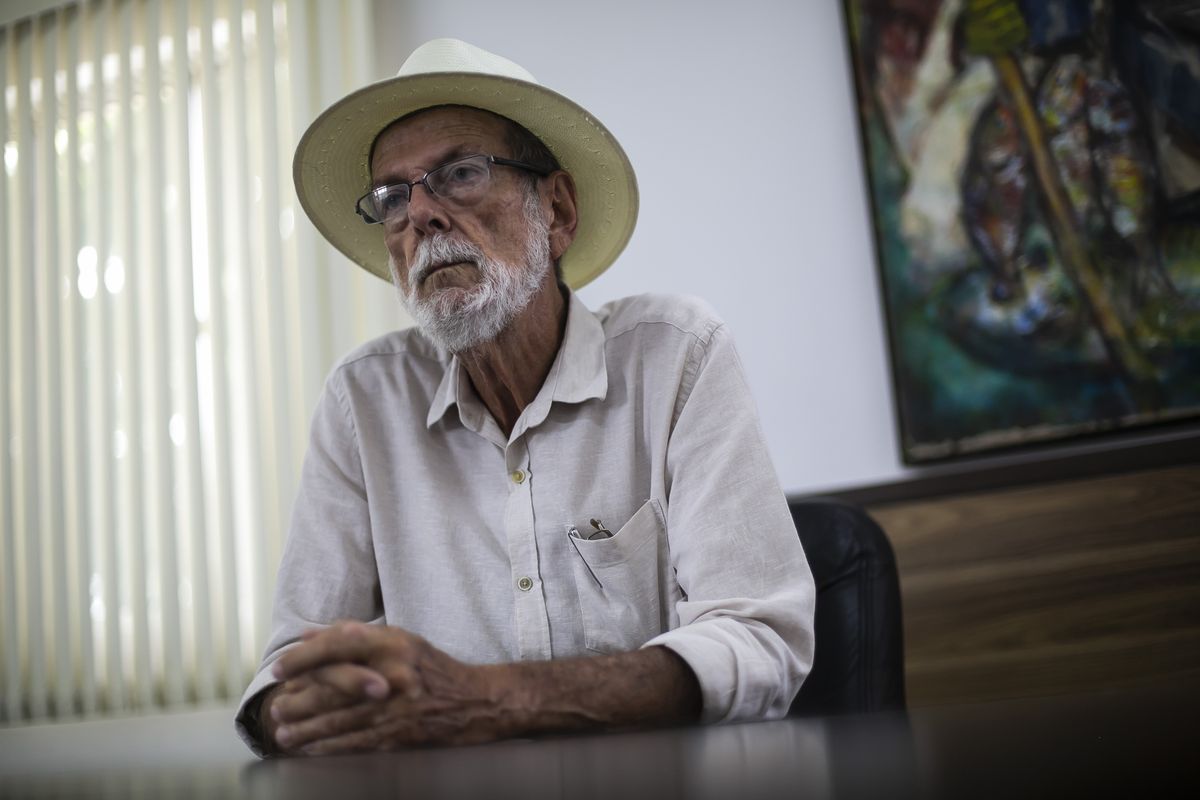 Mayor Jose Bonifacio listens during an interview in his City Hall office of Cabo Frio, Brazil, Wednesday, Dec. 15, 2021. Bonifacio acknowledges his city found itself under a spell. “The talk of the town was to know how much [bitcoin] was at, who was giving a bigger return,” he said.   (Bruna Prado)