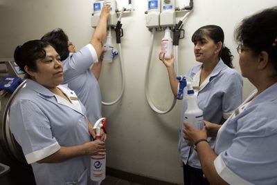 Housekeepers at the Sheraton Delfina fill spray bottles with electrolyzed water. The staff has ditched irritating bleach and ammonia in favor of the water to clean toilets and sinks. Los Angeles Times (Ken Hively Los Angeles Times / The Spokesman-Review)