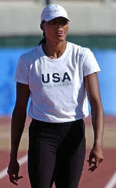 
Marion Jones tastes opportunity at these Olympics despite investigation for steroid use. 
 (Associated Press / The Spokesman-Review)